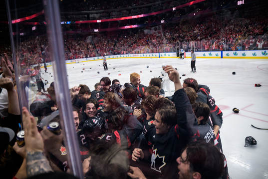 Players of Canada celebrate the game winning 3-2 goal in