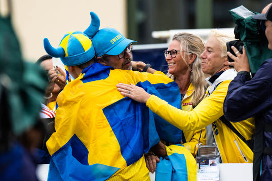 Perseus Karlström of Sweden celebrate with Kajsa Bergqvist