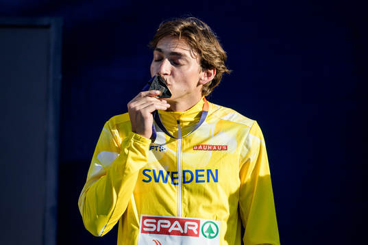 Armand Duplantis of Sweden celebrates at the medal ceremony