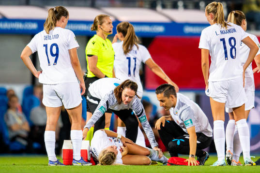 Ada Hegerberg of Norway gets medical treatment from physio