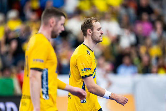 Niclas Ekberg and Lukas Sandell of Sweden look dejected