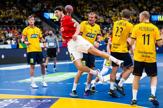 Jacob Tandrup Holm of Denmark takes a shot in front of Max