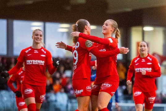 Marit Bratberg Lund of Brann celebrates with teammate Nora