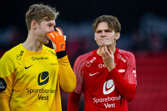 Goalkeeper Mathias Dyngeland and David Møller Wolfe of