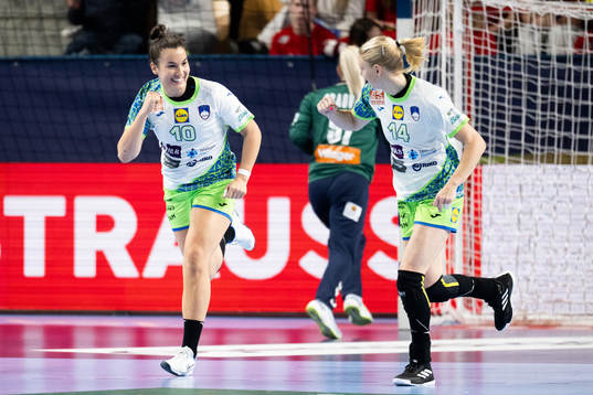 Tjasa Stanko and Tamara Mavsar of Slovenia celebrate