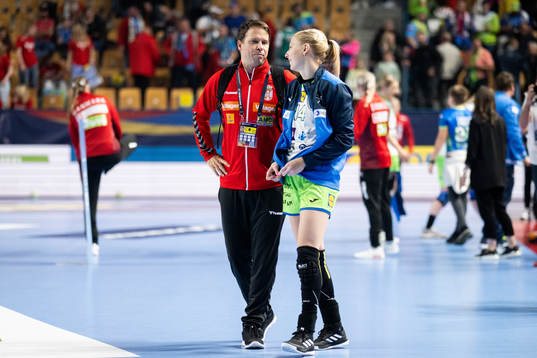 Head coach Dragan Markov of Serbia and Tamara Mavsar of