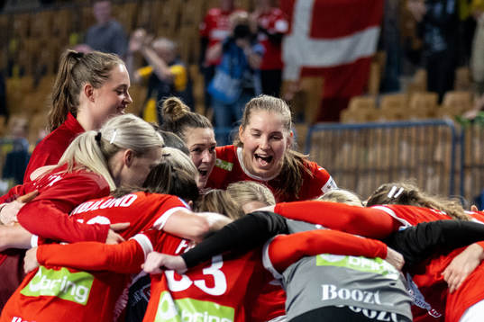Players of Denmark celebrate