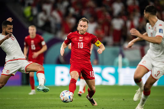 Ali Abdi of Tunisia and Christian Eriksen of Denmark
