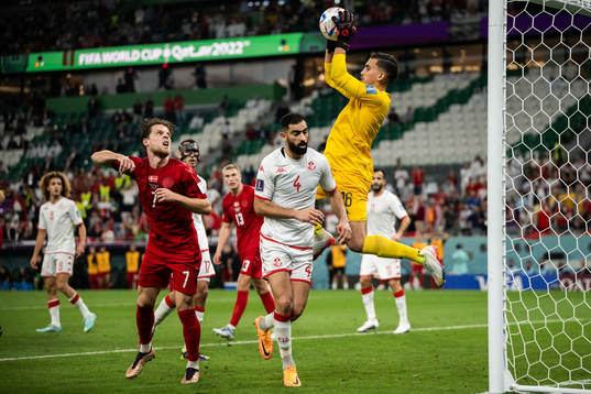 Mathias Jensen of Denmark against Yassine Meriah and