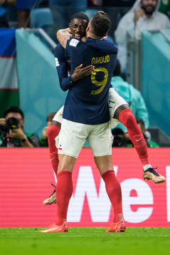 Ousmane Dembele and Olivier Giroud of France celebrate the