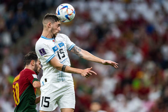 Bernardo Silva of Portugal and Federico Valverde of Uruguay