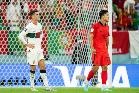 Cristiano Ronaldo of Portugal and Kyungwon Kwon of South