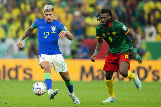 Bruno Guimaraes of Brazil and Andre-Frank Zambo Anguissa of