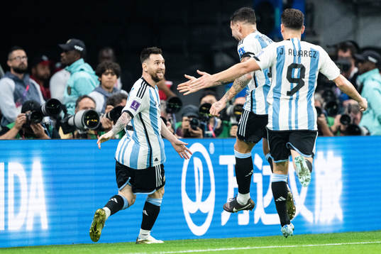 Lionel Messi of Argentina celebrates with Nicolas Otamendi
