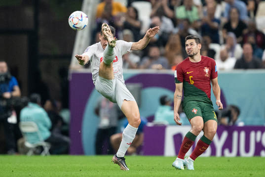 Remo Freuler of Switzerland and Raphael Guerreiro of