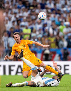 Luuk de Jong of Netherlands and Nicolas Otamendi of