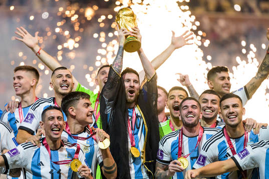 Lionel Messi of Argentina lifts the FIFA World Cup Trophy