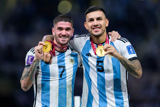 Rodrigo de Paul and Leandro Paredes of Argentina pose with