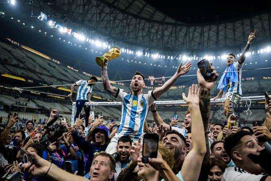 Lionel Messi of Argentina celebrates with the World Cup