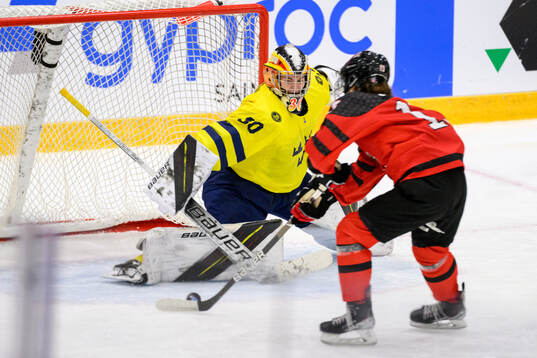 goaltender Felicia Frank of Sweden and Morgan Jackson of