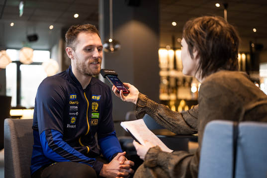 Albin Lagergren is interviewed at a press event with Sweden
