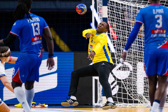 Goalkeeper Edmilson Goncalves of Cape Verde gets hit in the