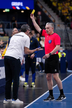 Head coach Jose Maria Vaquero Rodriguez of Hungary receives