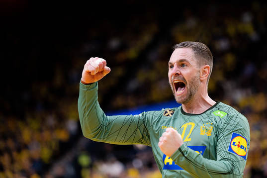 Goalkeeper Andreas Palicka of Sweden celebrates