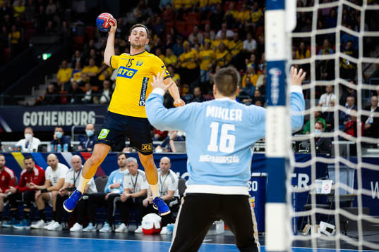 Hampus Wanne of Sweden and goalkeeper Roland Mikler of