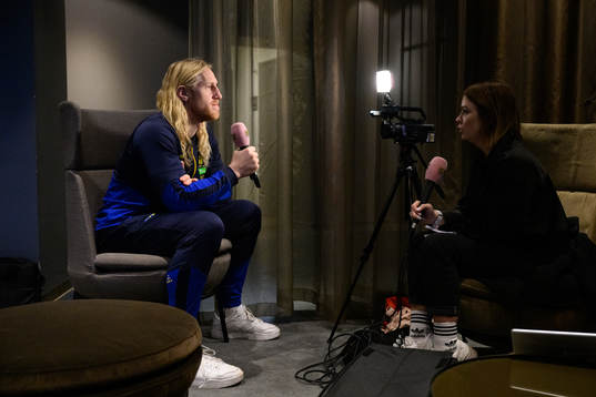 Goalkeeper Mikael Appelgren is being interviewed at a press