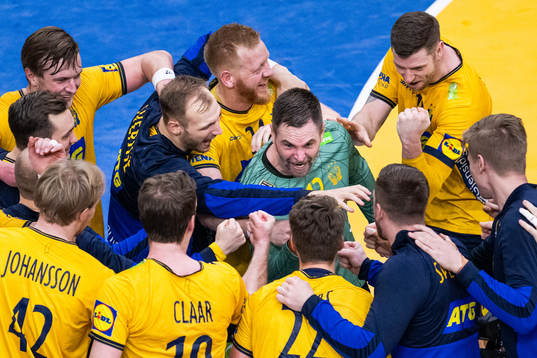 Andreas Palicka of Sweden celebrates with team mates