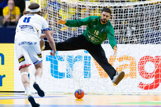 Bjarki Mar Elisson of Iceland scores