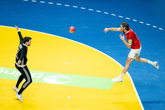 Jacob Tandrup Holm of Denmark against goalkeeper Marton