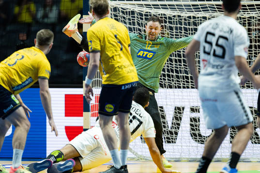 Ali Mohamed of Egypt against goalkeeper Andreas Palicka of