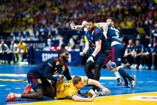 Dika Mem and Nicolas Tournat of France defend against Albin