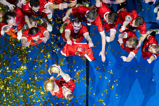 Mathias Gidsel of Denmark celebrate with the trophy