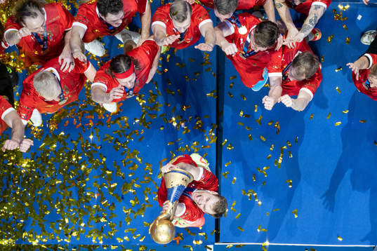 Mathias Gidsel of Denmark celebrate with the trophy