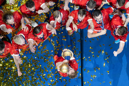 Mathias Gidsel of Denmark celebrate with the trophy