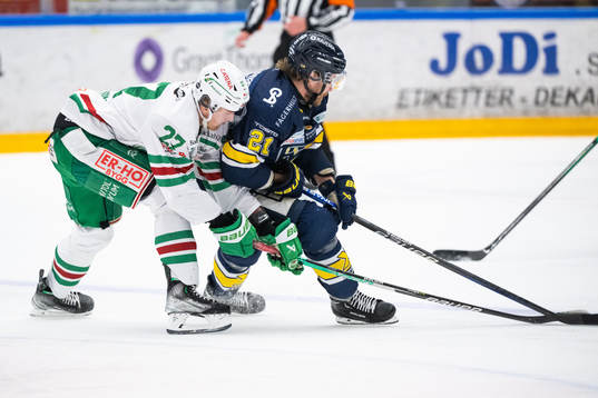 Rögles Linus Sjödin och HV71s Mattias Tedenby