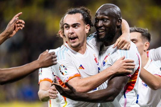 Arthur Theate and Romelu Lukaku of Belgium celebrate