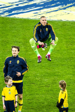 Hjalmar Ekdal and goalkeeper Robin Olsen of Sweden
