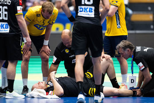 Max Darj of Sweden and Paul Drux of Germany in pain