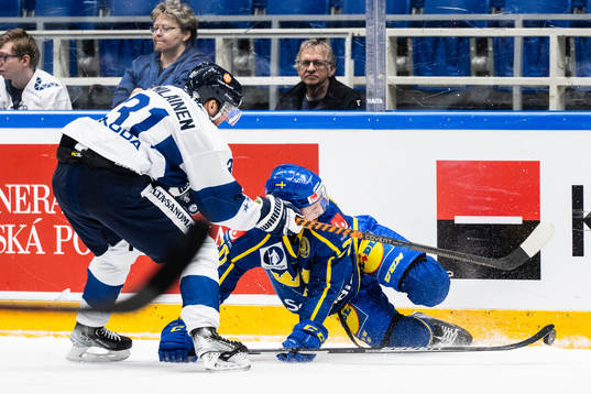 Valtteri Kemiläinen of Finland and Dennis Rasmussen of