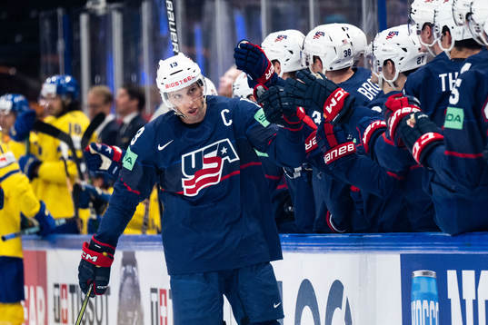 Nick Bonino of USA celebrates with team mates