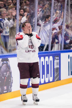 Rihards Bukarts of Latvia celebrates