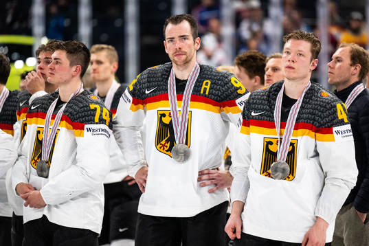 Justin Schutz, Marcel Noebels and Jonas Müller of Germany