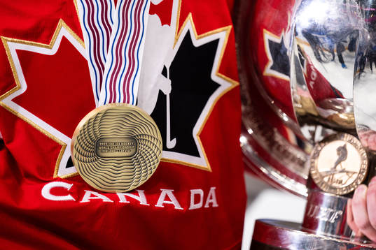 Tyler Toffoli of Canada with gold medal and trophy