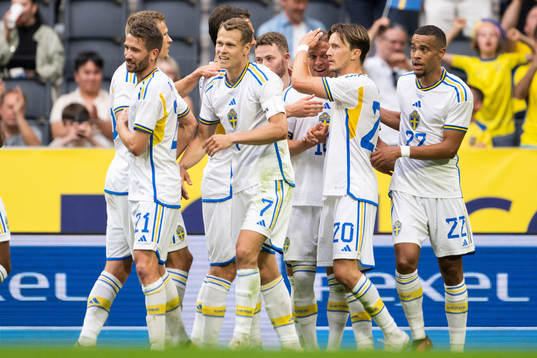 Jesper Karlsson of Sweden celebrate with team mates