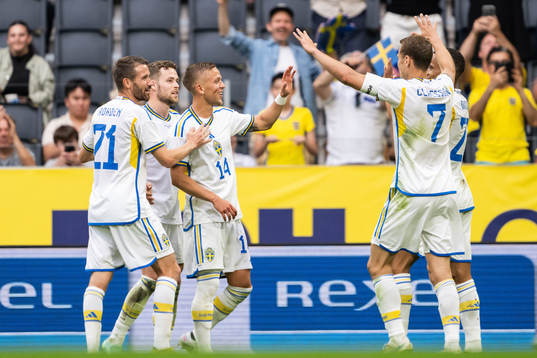 Jesper Karlsson of Sweden celebrate with his team mates
