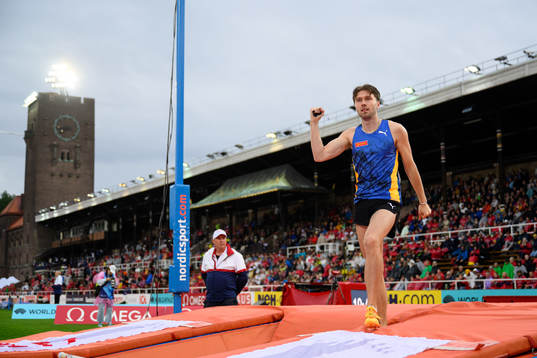 Pål Haugen Lillefosse of Norway celebrates in men's pole